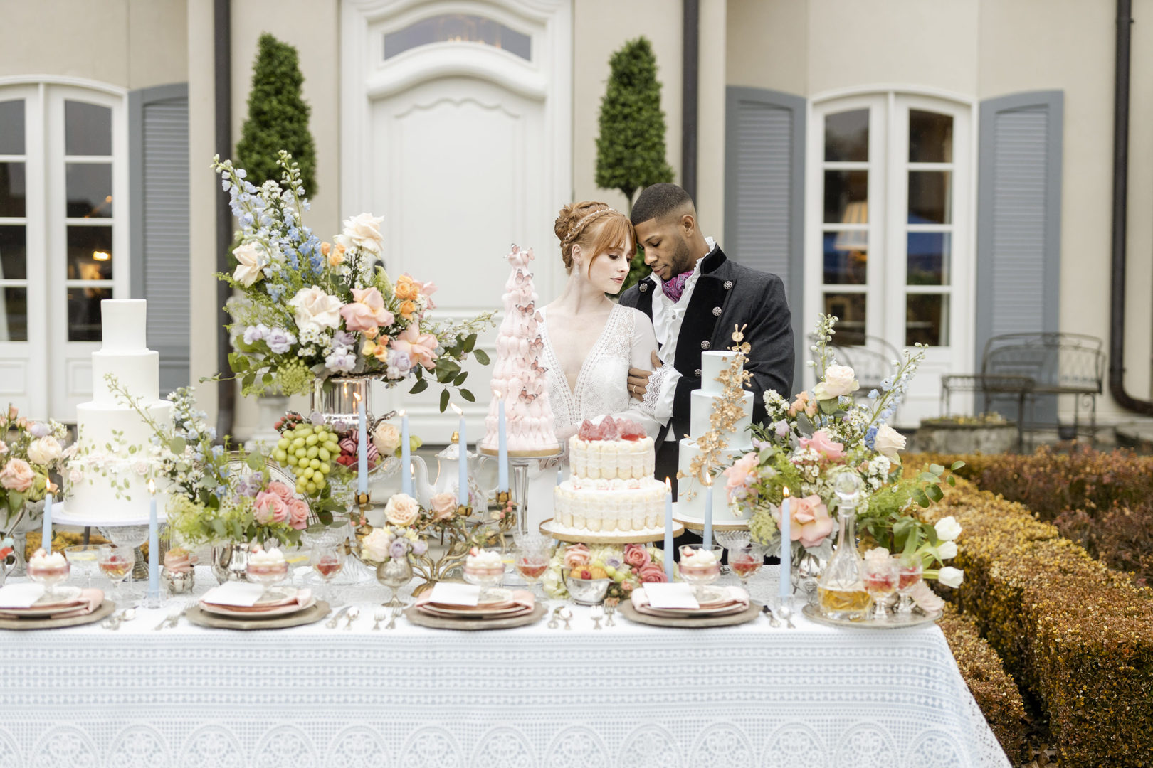 Bridgerton Style Wedding with black groom and redhead bride outside of a gorgeous mansion