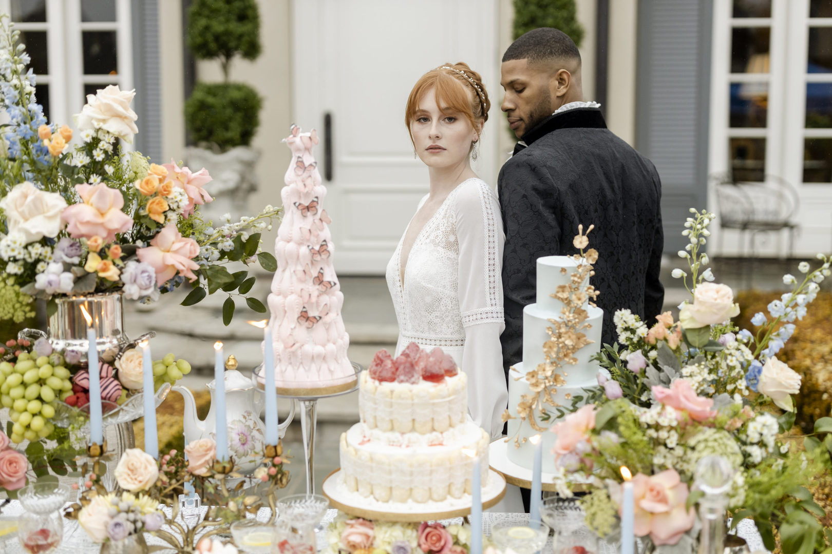 Bridgerton Style Wedding with black groom and redhead bride outside of a gorgeous mansion