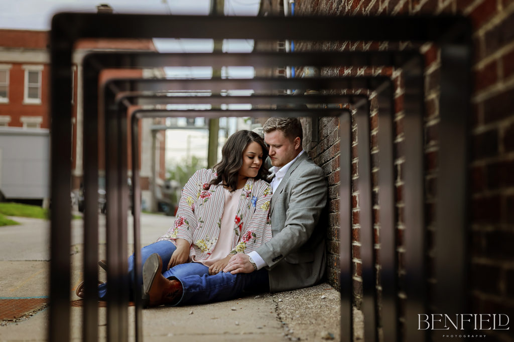 This Best Engagement Photos of 2021 is of a bride and groom shot with a creative angle.