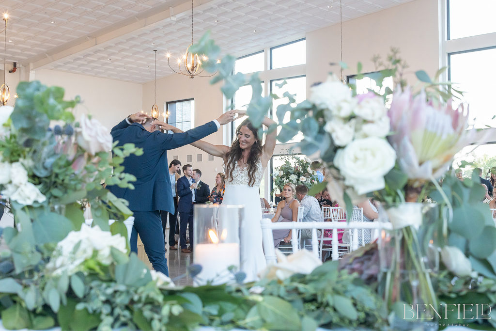 Weddings at Osage House with bride and groom's first dance in the ballroom reception space
