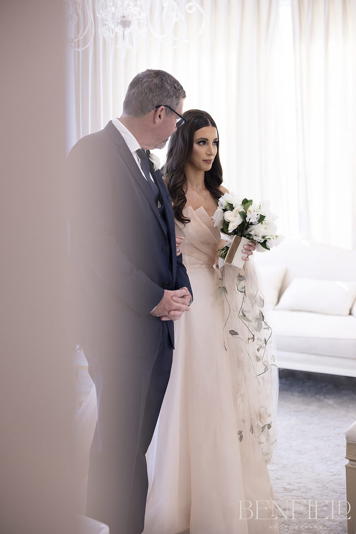 Special, intimate moment between father and bride before walking down the aisle for her Hillside Estate Wedding Ceremony.