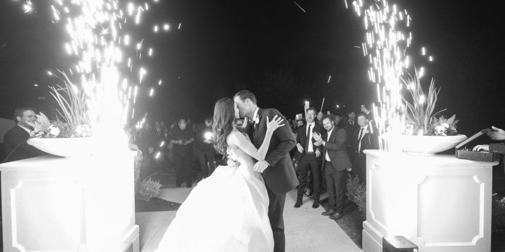 handcrafted wedding album spread of a luxury wedding at The Hillside Estate in Cross Roads TX