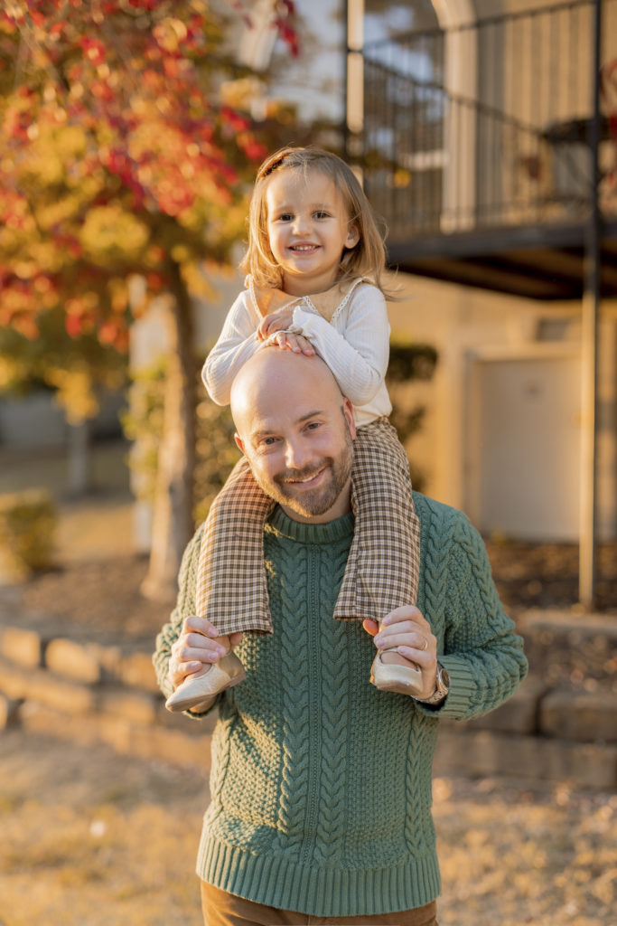 Daddy daughter fall portraits with autumn leaves