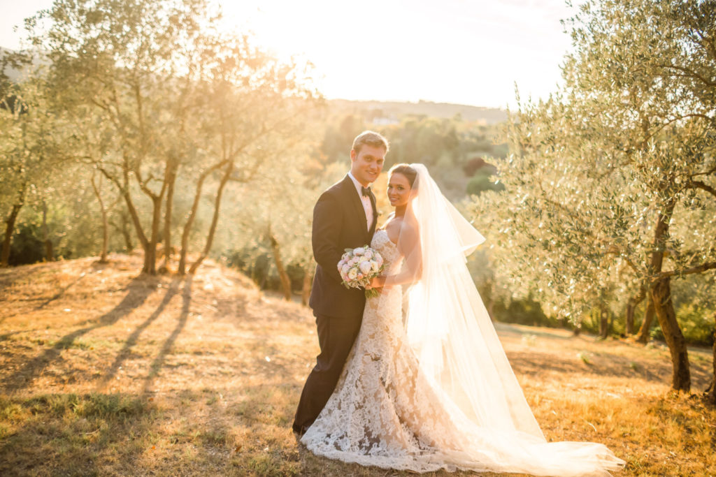 luxury wedding photographer shoots a bride and groom at La Piazzole villa in Florence Italy during golden hour