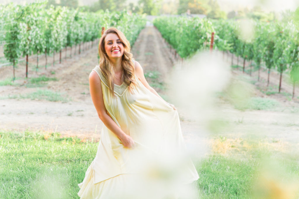 sexy wife in a see-through sundress in a napa vineyard