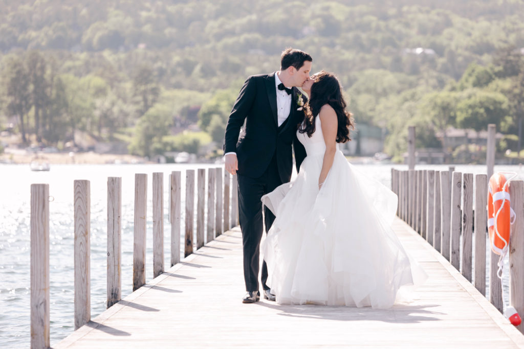 Best kisses of 2022 nominees include this kiss of the bride and groom on a dock at the Sagamore on Lake George