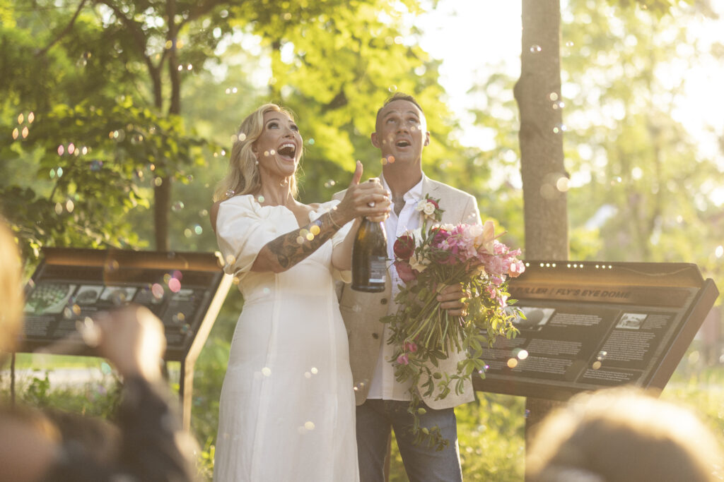Wedding at Crystal Bridges for Kelly and Erik and then pop champagne at golden hour