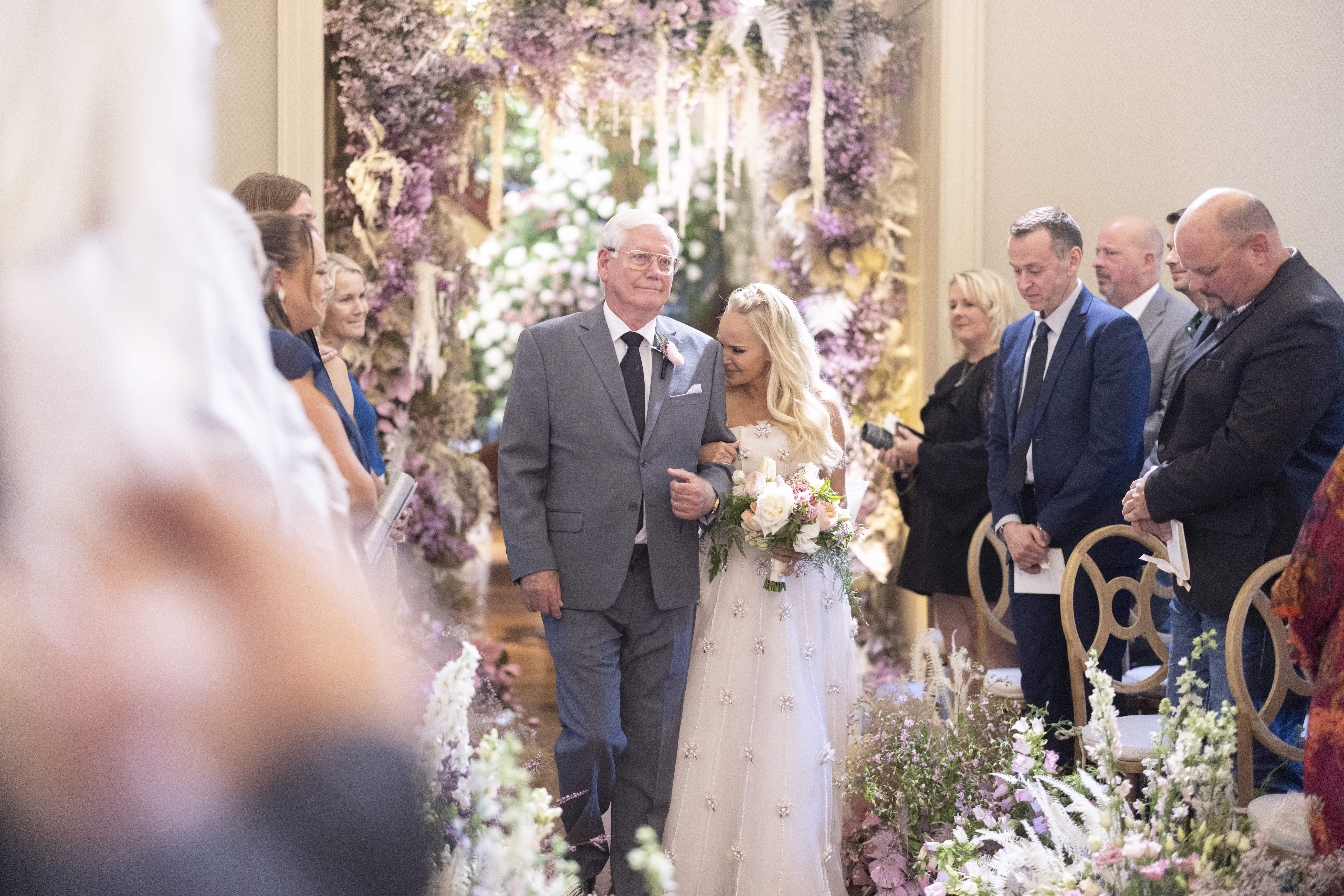 Kristin Chenoweth cries as her dad escorts her down the wedding aisle during her ceremony with Josh Bryant.