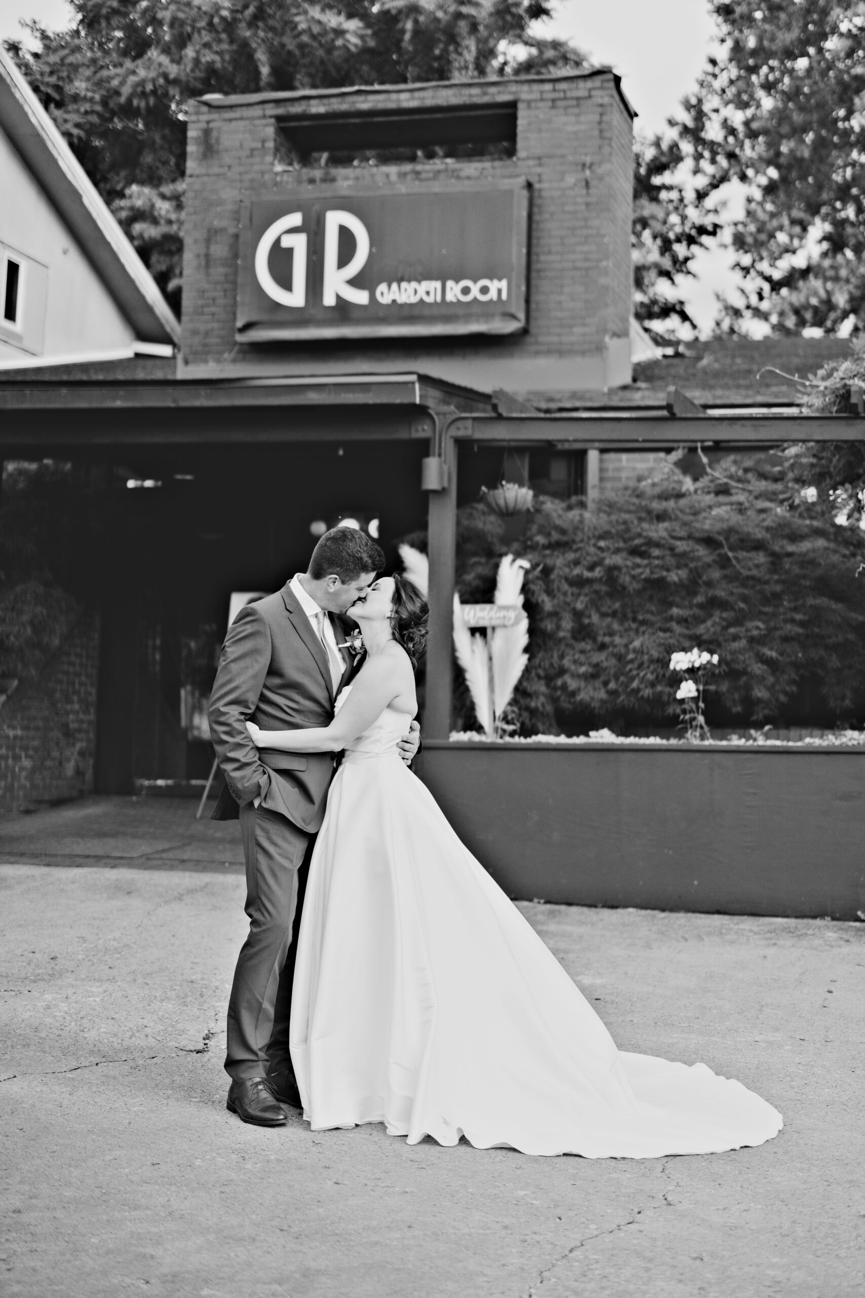 Fayetteville Garden Room wedding portrait in front of the Garden Room entrance.