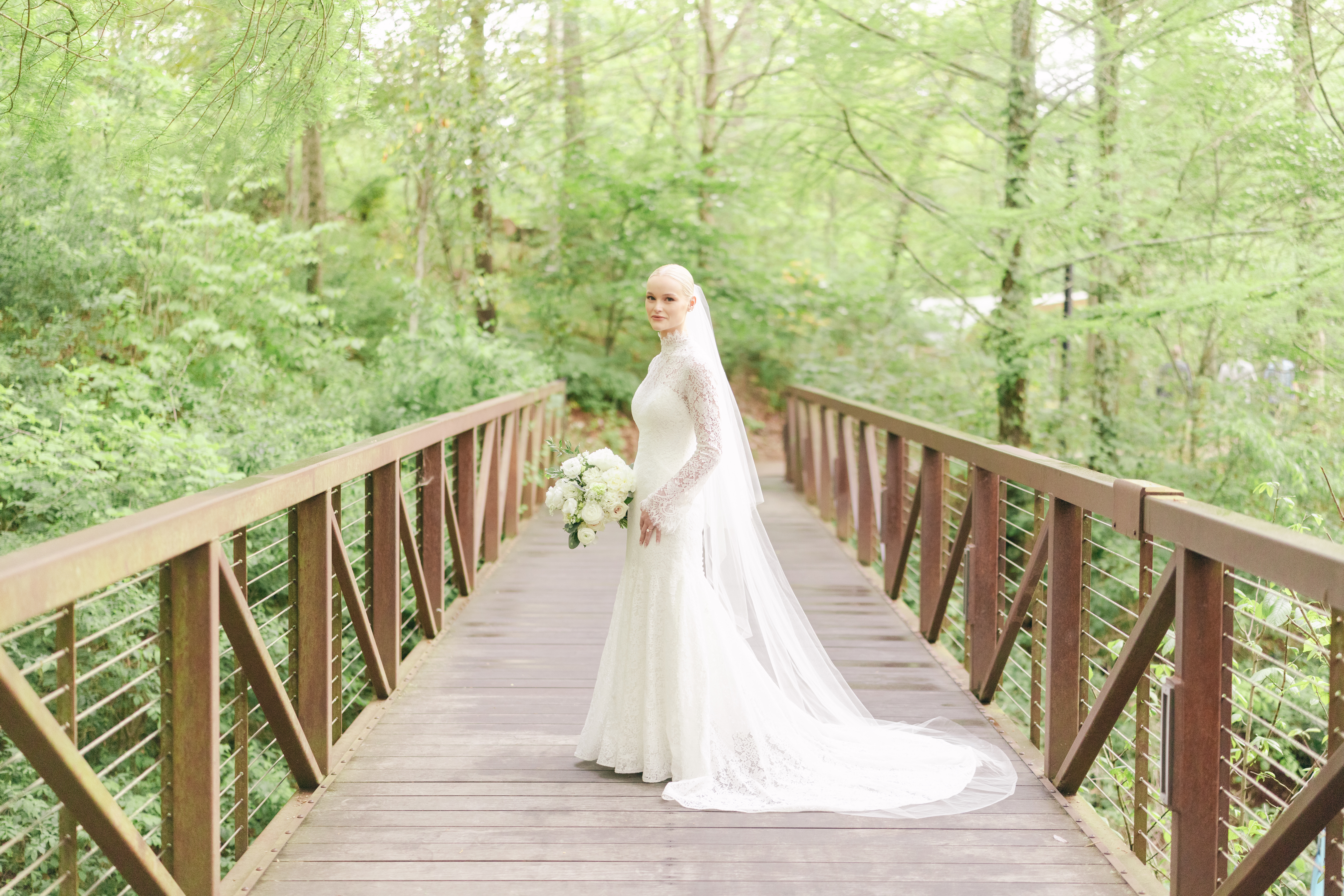 Bridal portrait at Crystal Bridges Museum with modern architecture and spring greenery