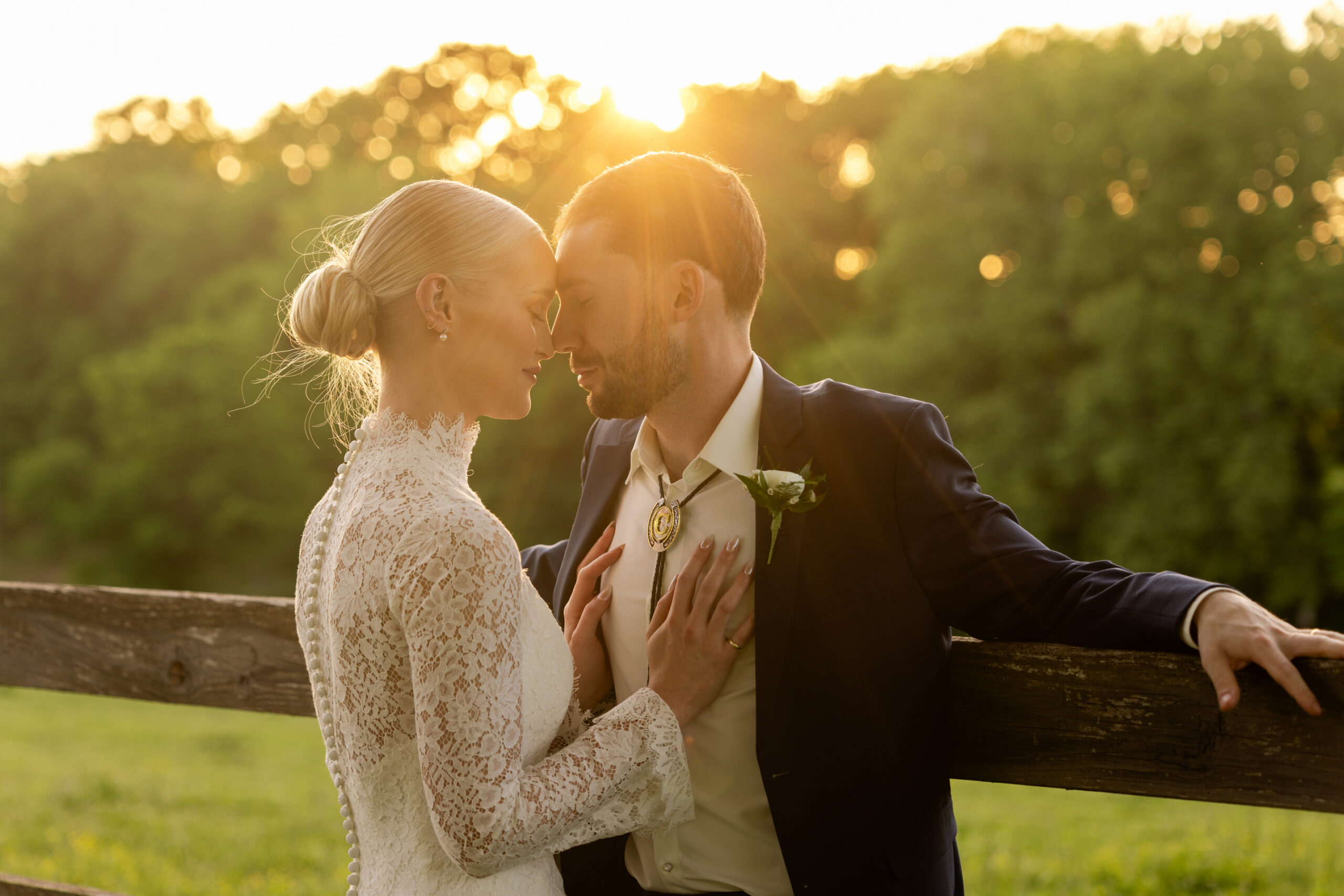 Elegant bride and groom sunset portrait at outdoor wedding in Northwest Arkansas.