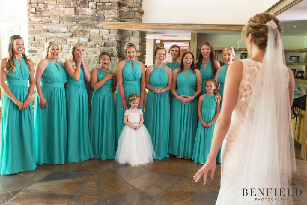 bride first look reveal with bridesmaids