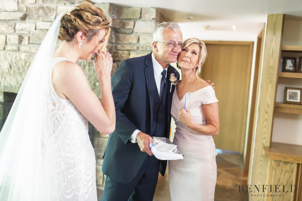 bride giving parents wedding gifts