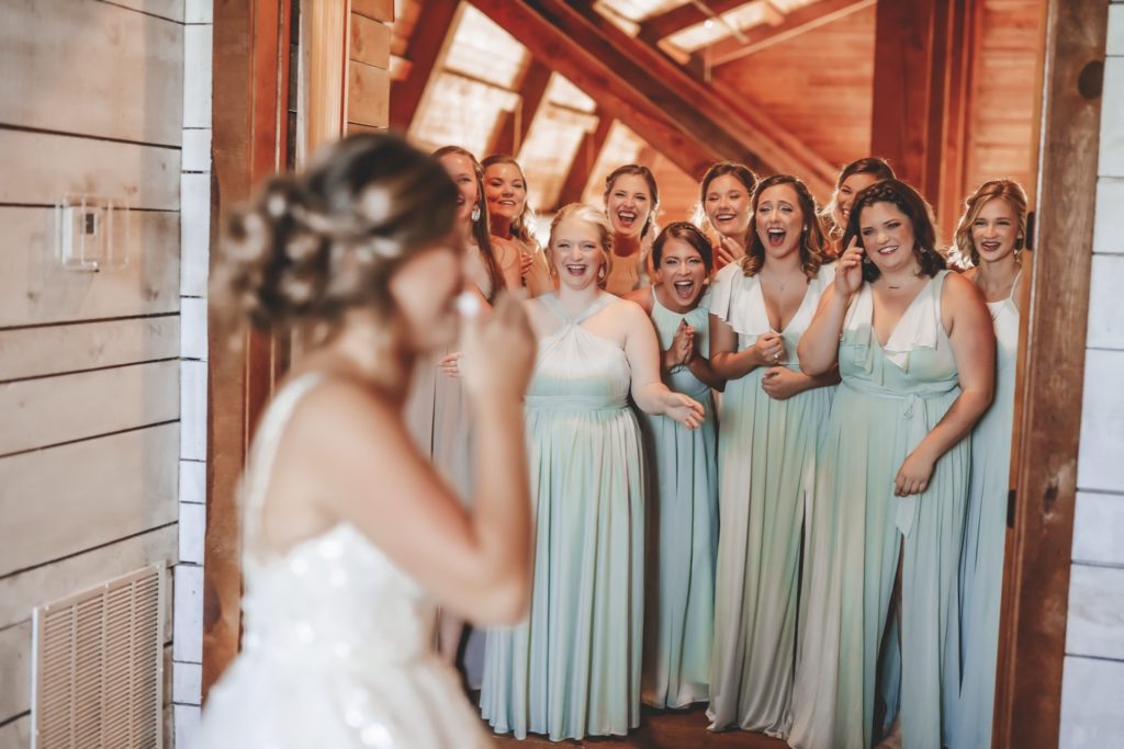 first reveal with bridesmaids and bride - emotional moment with bridesmaids