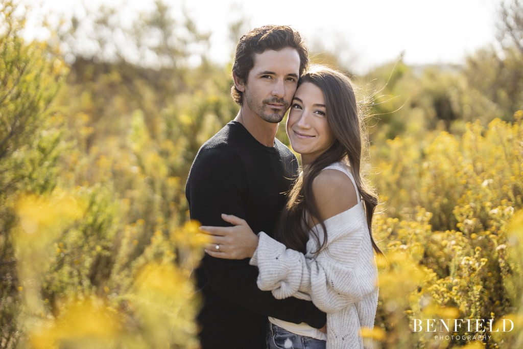 couple kissing at sunset near Malibu Winery for their engagement pictures