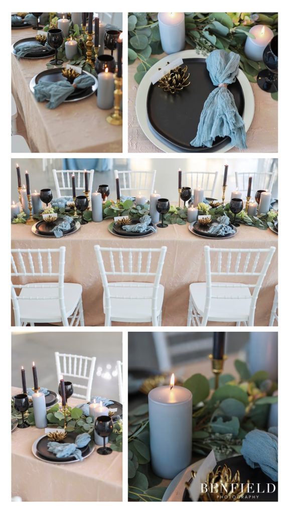 modern wedding table setting with black goblets and blue napkin