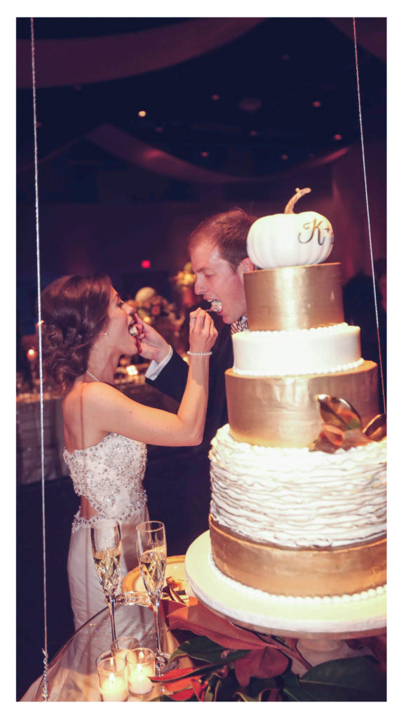Eating a gold wedding cake at Fayetteville Town Center