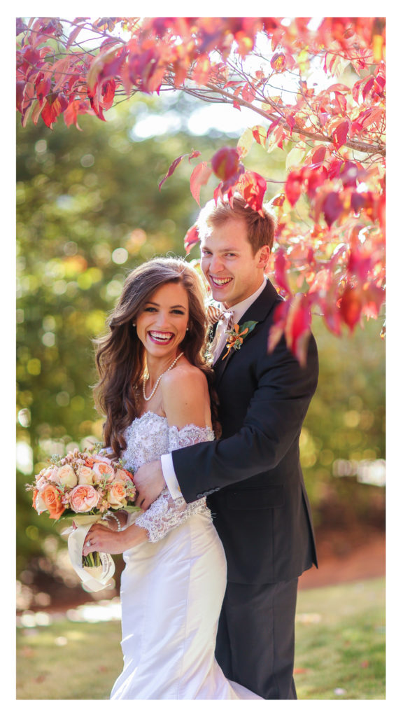 Fall wedding portrait in front of Old Main