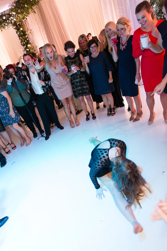 This wedding guest in a short black dress doing the splits shocked everyone at this beautiful reception in this Best Wedding Dance nominee.