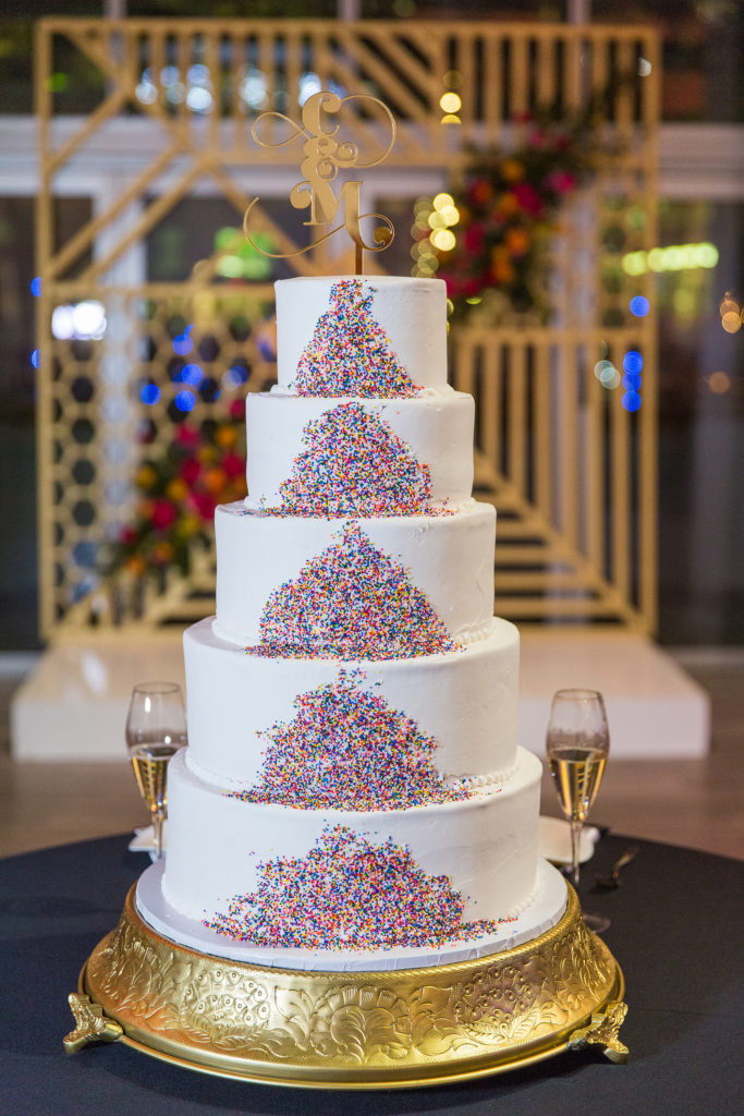 Cupcake sprinkles are so festive and representative of the confetti canons that blasted at midnight for this NYE wedding cake. 