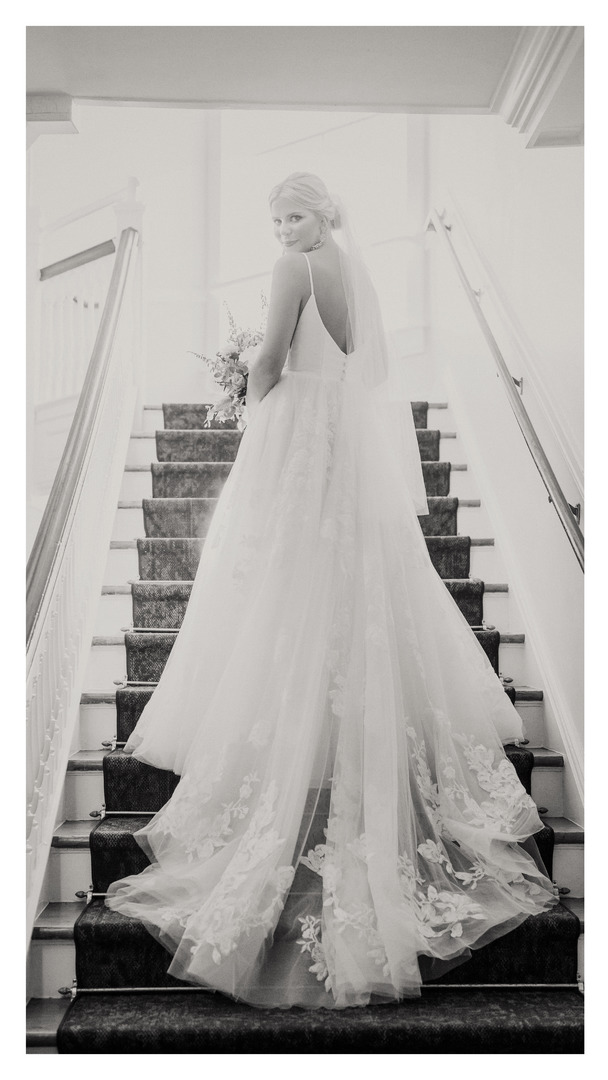 bridal portrait on staircase inside Carnall Hall