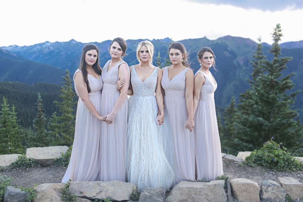 fun and cool bridesmaid picture on top of Aspen Mountain