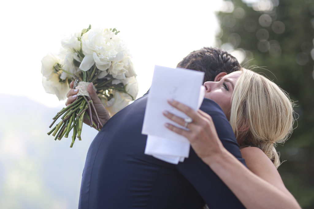 emotional bride and groom first look at Little Nell on Aspen Mountain