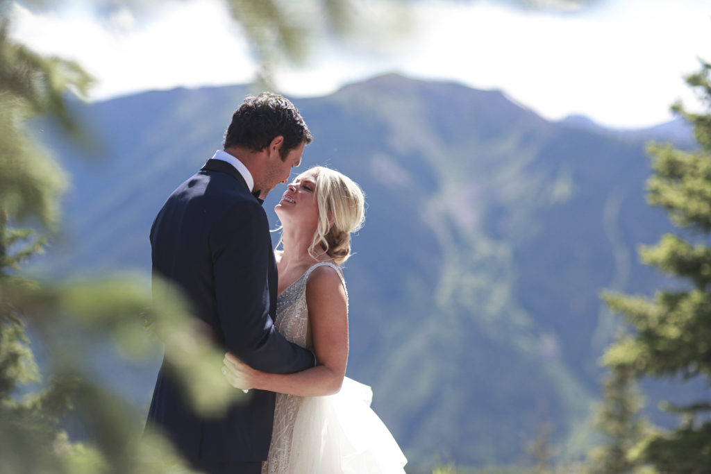 bride and groom first look at Little Nell on Aspen Mountain