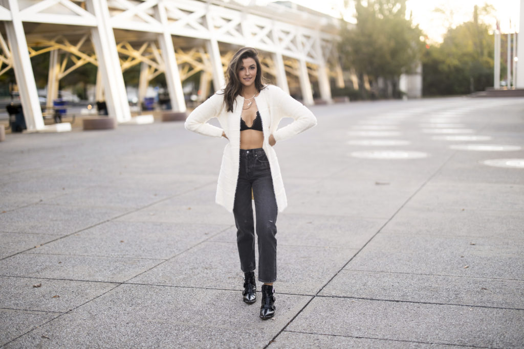 Tia Booth in bralette and sweater look from Alexis and Bolt in Nashville