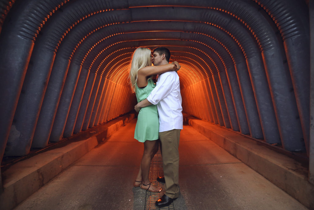 Couple kissing inside a tunnel