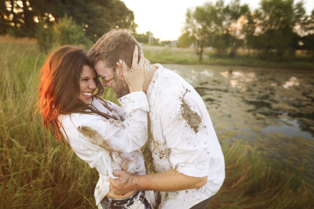 Amy Duggar and Dillon King engagement photos fighting in the mud.