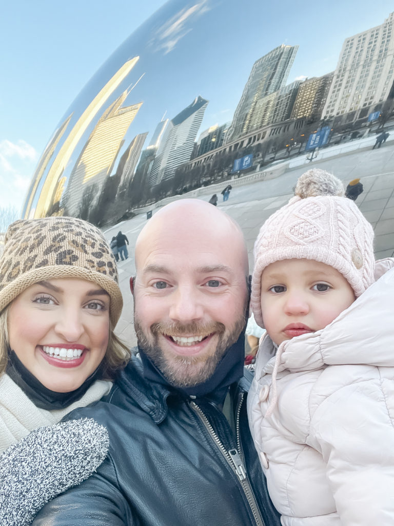 family selfie at the bean at Millennium Park in Chicago