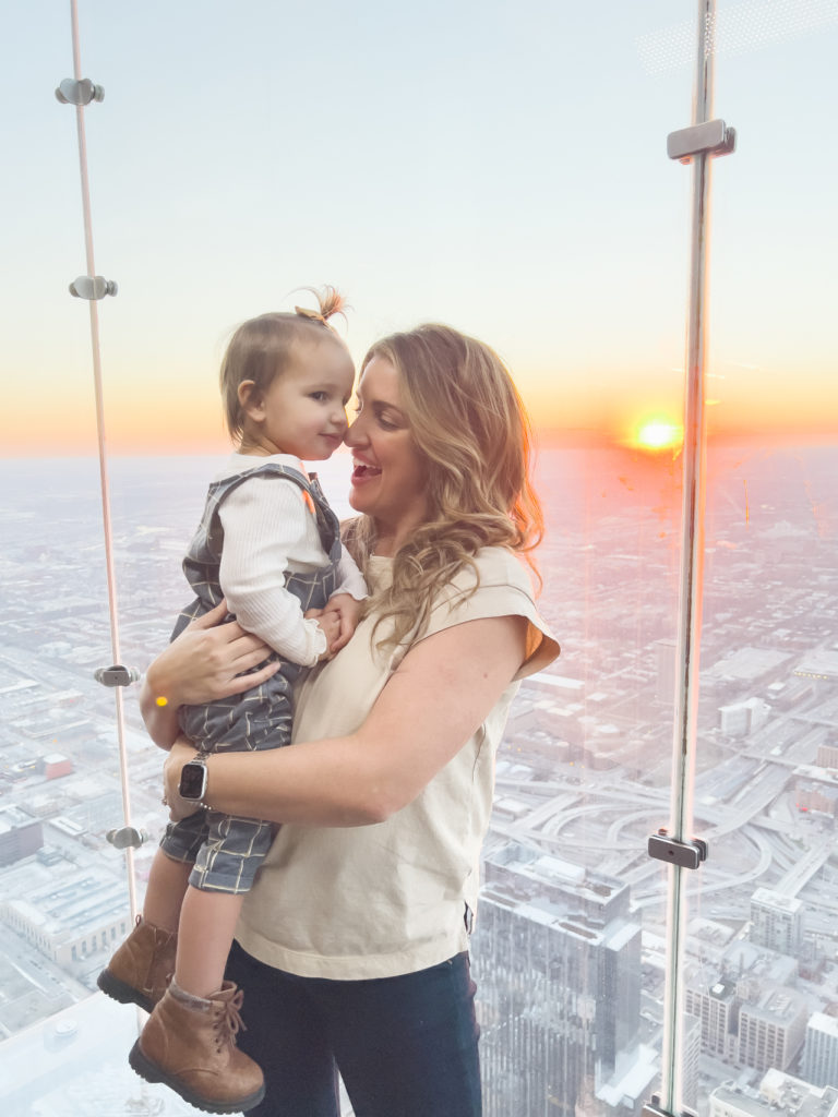 mother and daughter at sunset from the willis tower