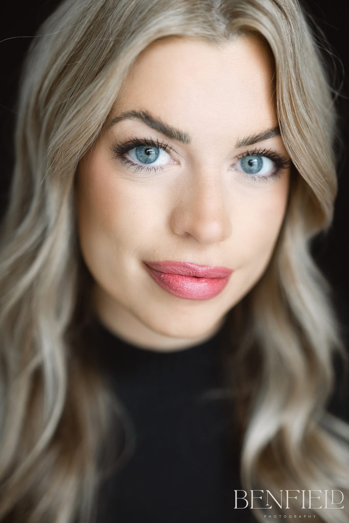 5 Reasons You Need New Headshots, shown by gorgeous blonde female realtor