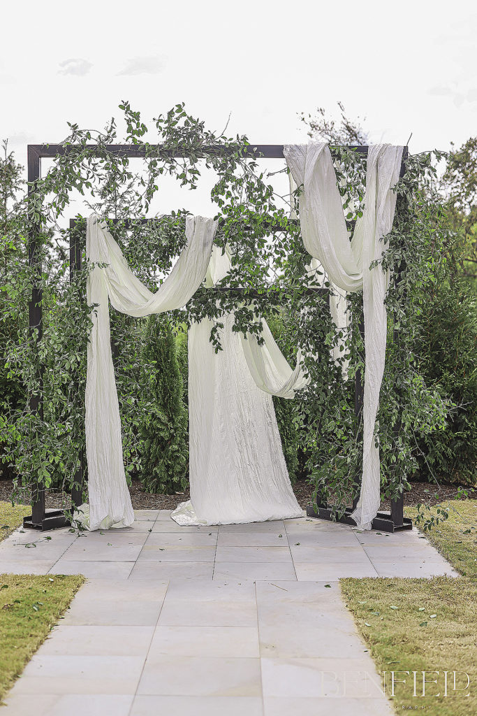 Draped Arches for a unique outdoor ceremony location available for Weddings at Osage House in Cave Springs Arkansas