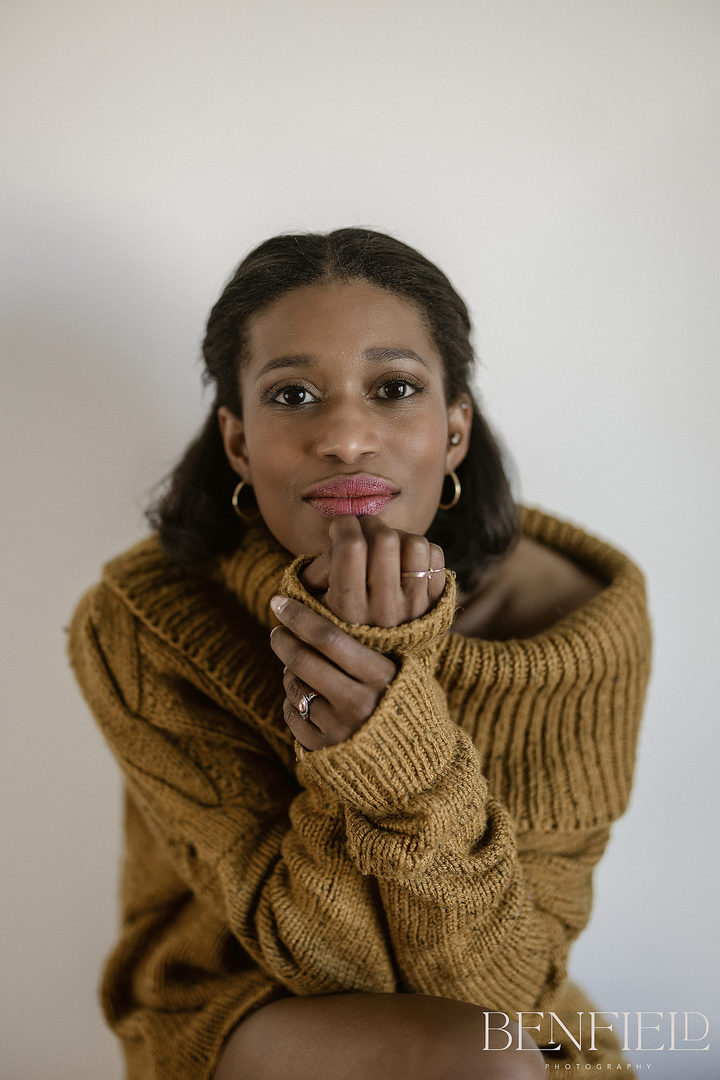 Black female gorgeous supermodel carmen posing with a chunky sweater as her only clothing in a sexy and fun photo shoot