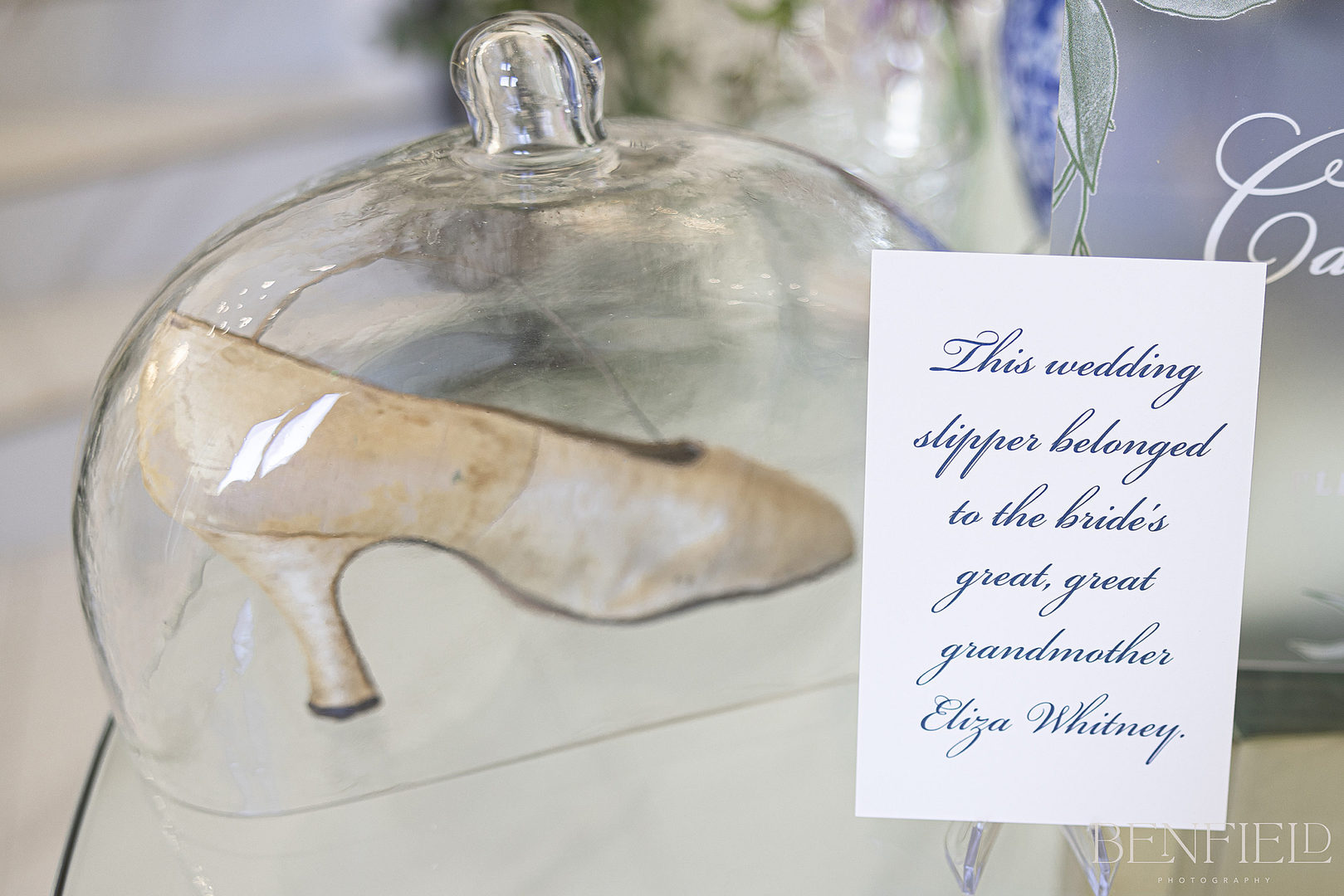 antique wedding shoes on display at the entrance of this luxury wedding at hillside estate near Frisco Texas