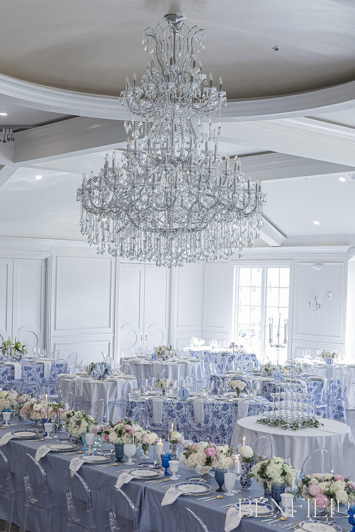 Hillside Estate Wedding Reception Details of the floor layout and table centerpieces with huge chandelier.