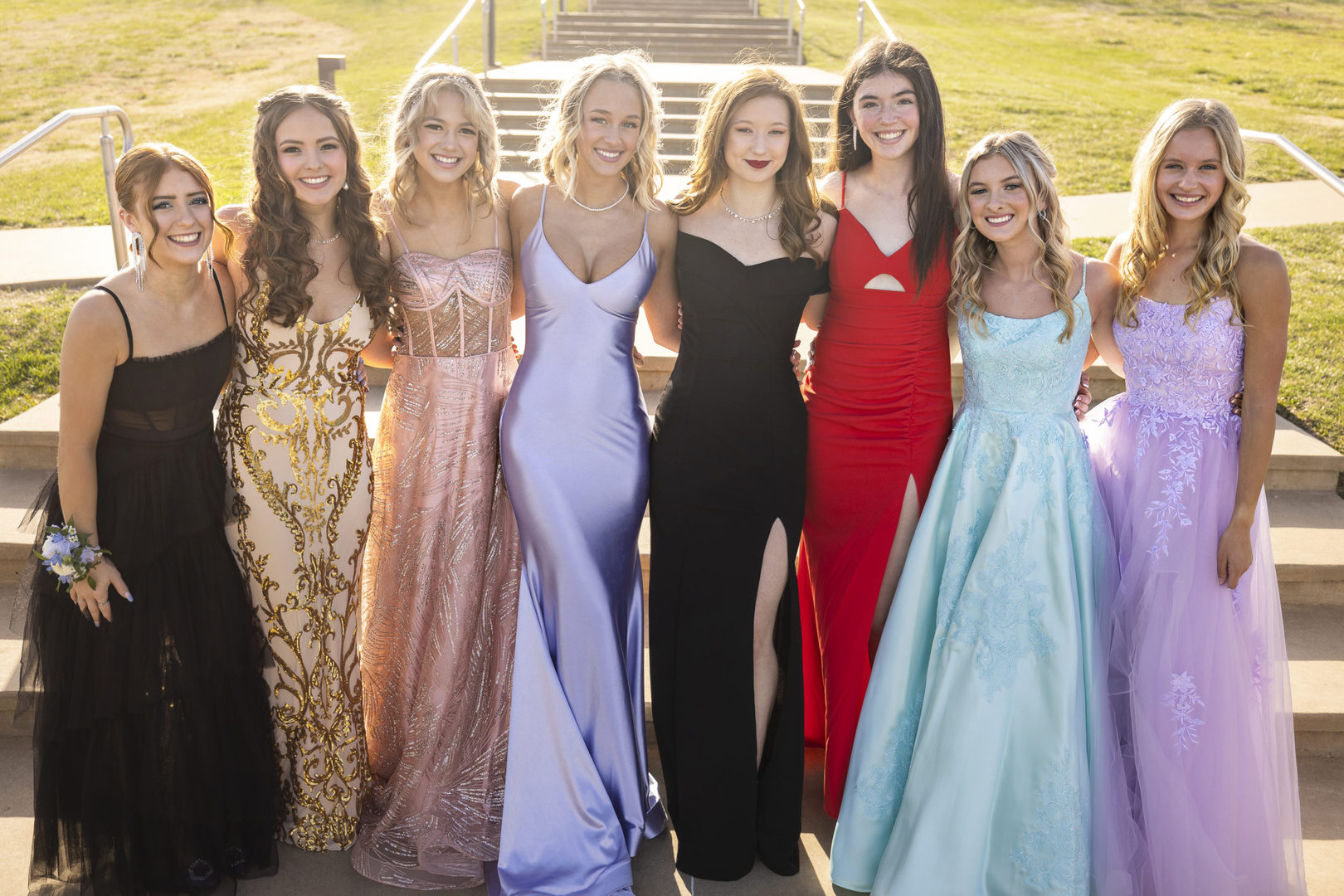 Group of girlfriends posting together for Prom night portraits