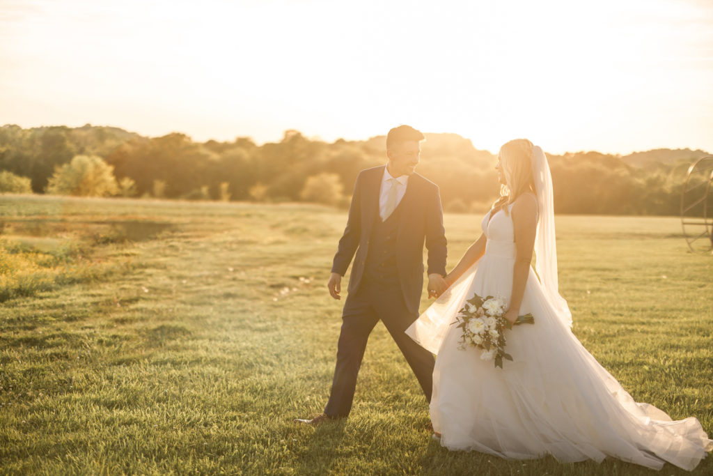 bride and groom wedding portraits at allenbrook farms wedding during sunset golden hour