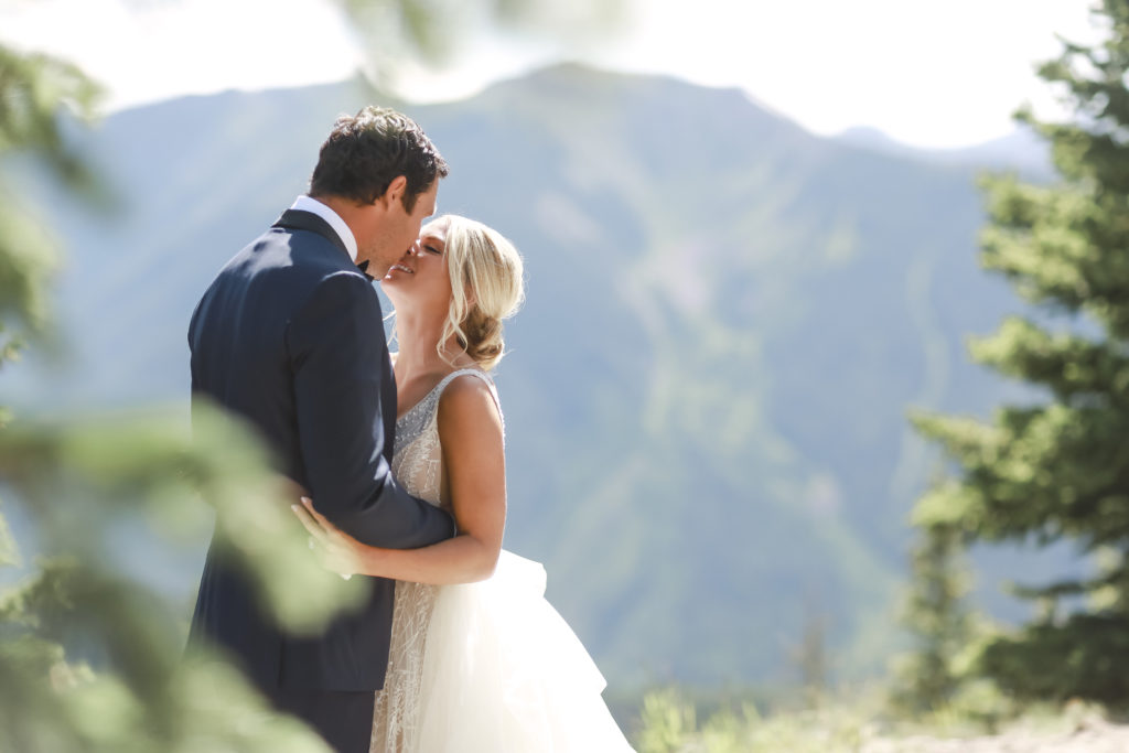 first look with Emma and Sam Bradford at their wedding in Aspen