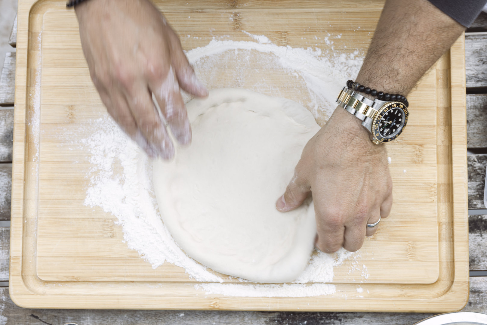 how to take great food photos for pizza party night by shooting pizza chef flatten pizza dough