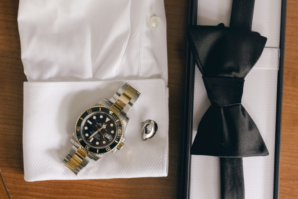 Photo Guide for 2nd Shooters: Shoot the groom's details, like this Rolex watch, cuff links, and black bowtie