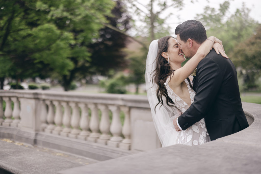 sexy wedding photos of the bride and groom kissing at Congress Park following their first look