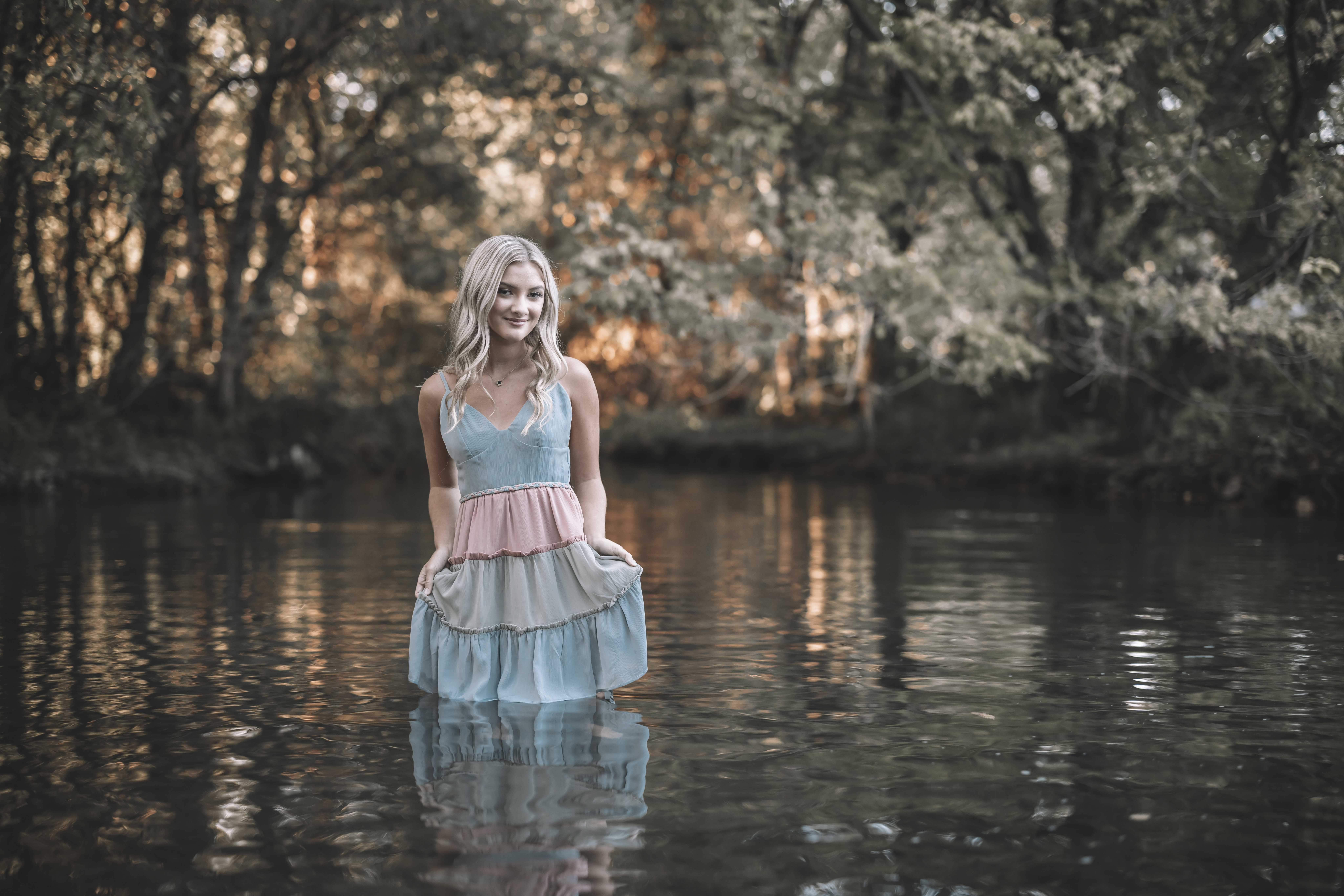 senior photos in water in NWA by Benfield Photography