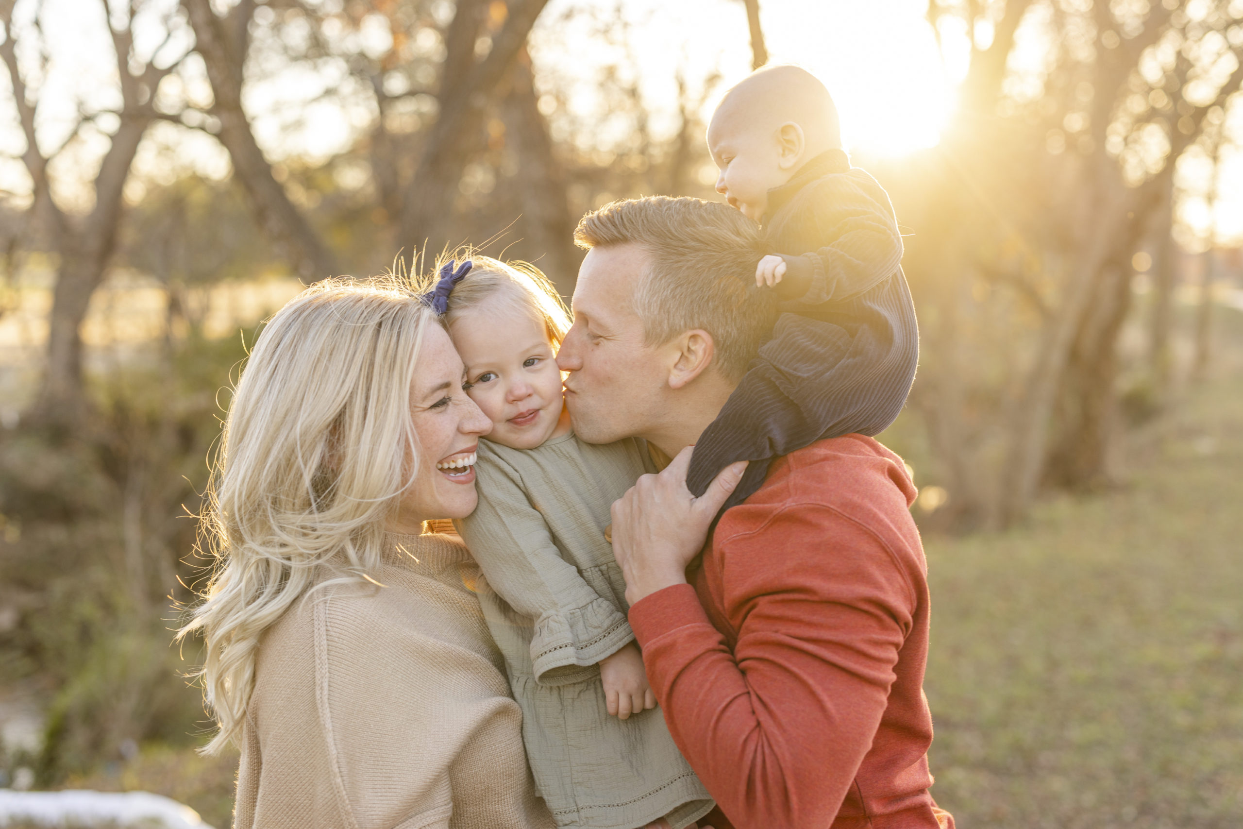 Fall Family Photographer in NWA shoots the Roberts family during golden hour