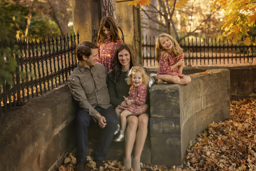 Fall Mini Session in NWA for George Family in a fun candid moment with fall leaves