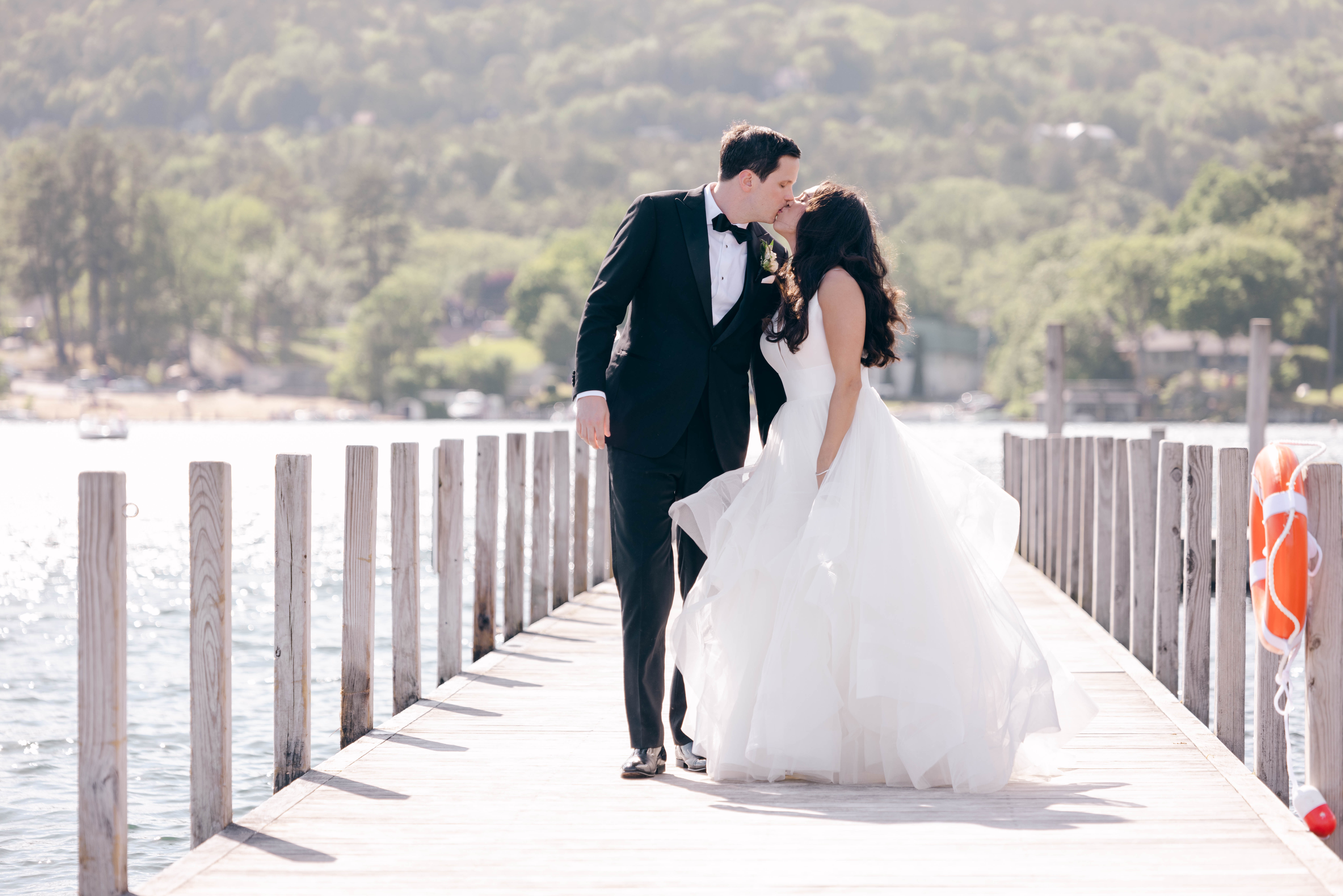 Best kisses of 2022 nominees include this kiss of the bride and groom on a dock at the Sagamore on Lake George