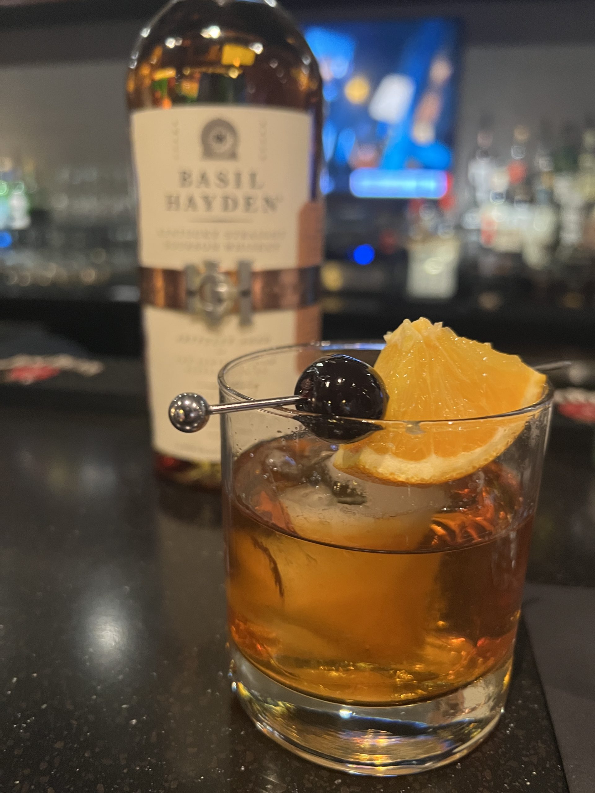 upgraded old fashioned with basil haydens and luxardo cherries