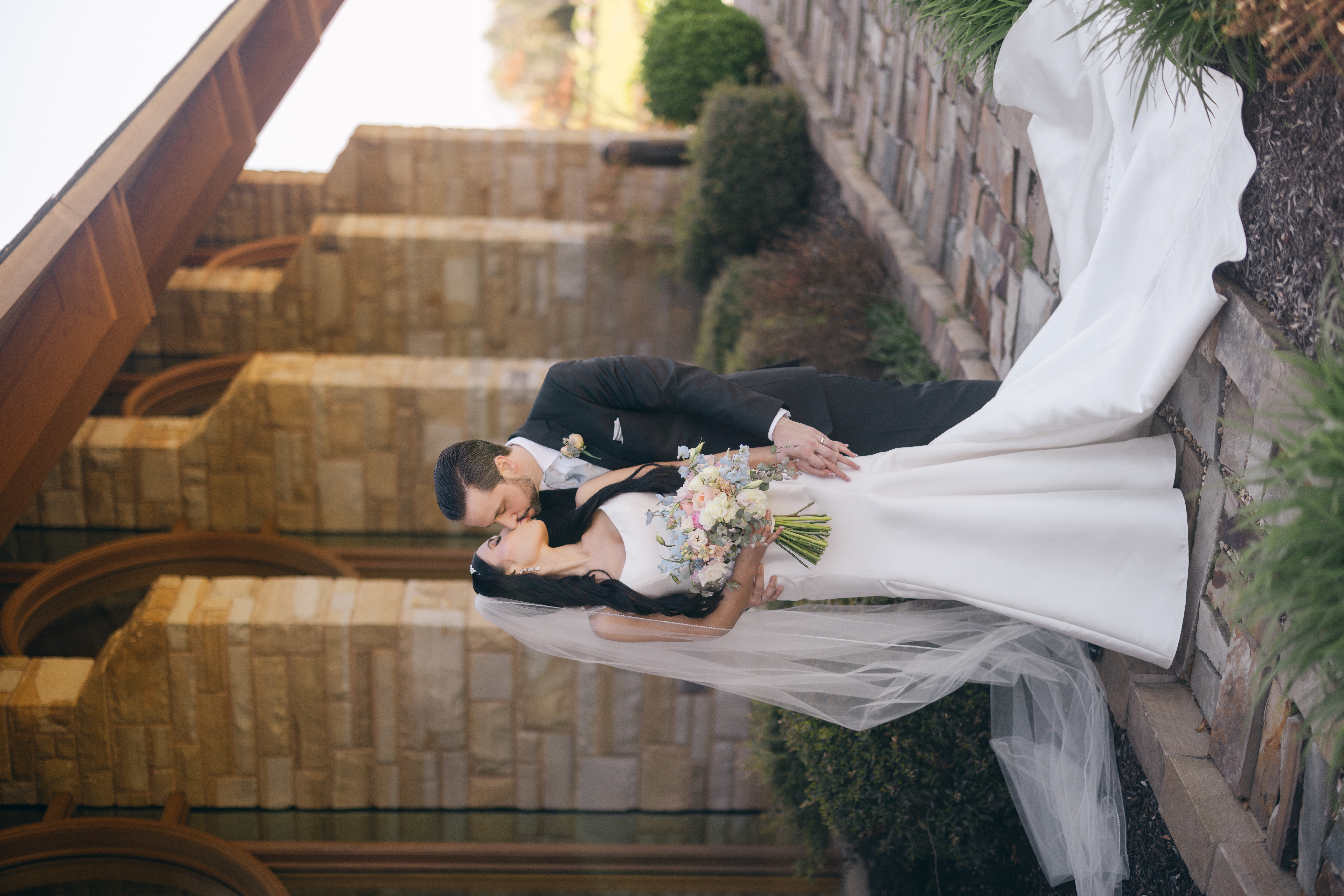 Bride and groom portraits outside Hunt Chapel Rogers Arkansas spring